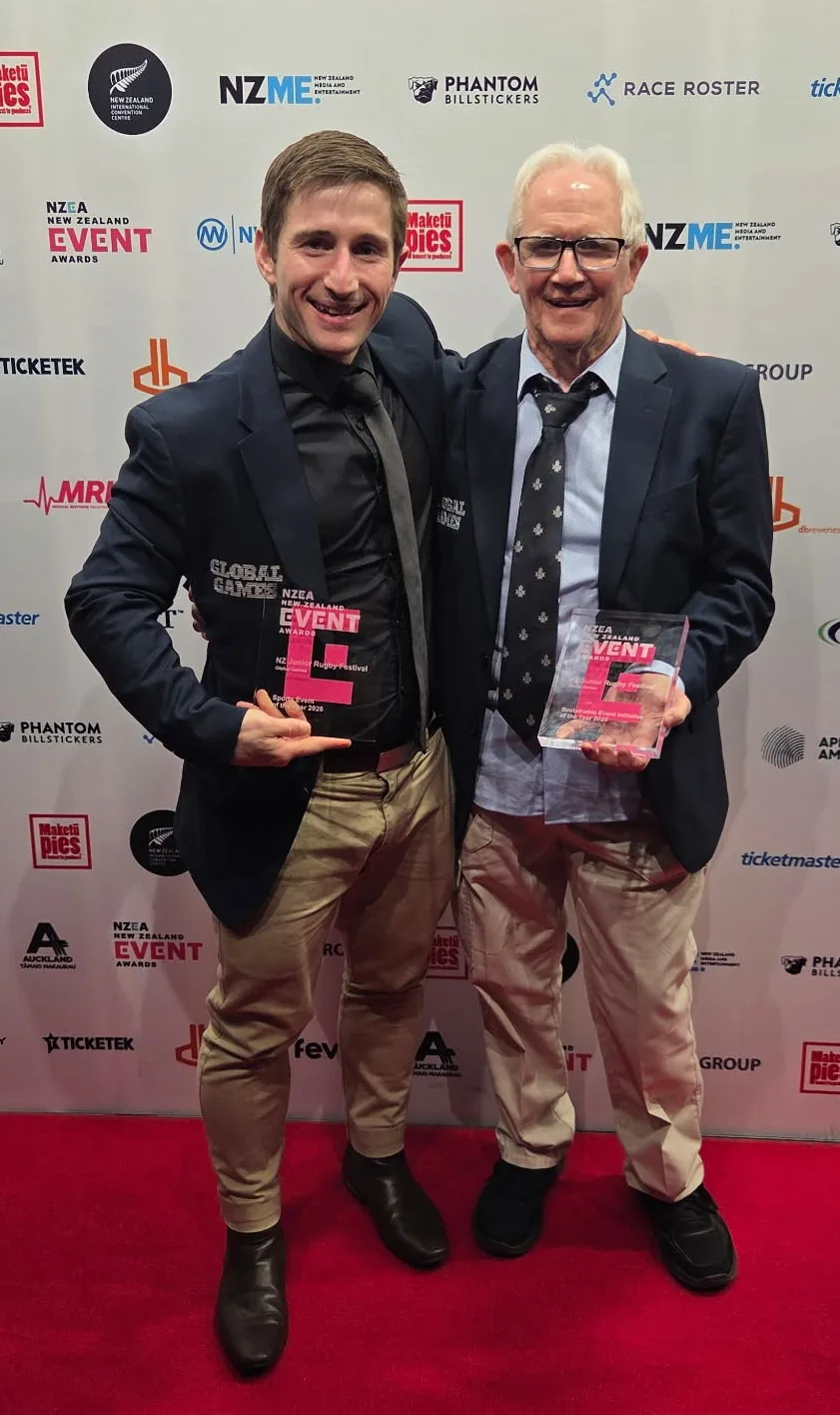 Jason Hart holding the 2026 New Zealand Event Awards trophies for the NZ Junior Rugby Festival